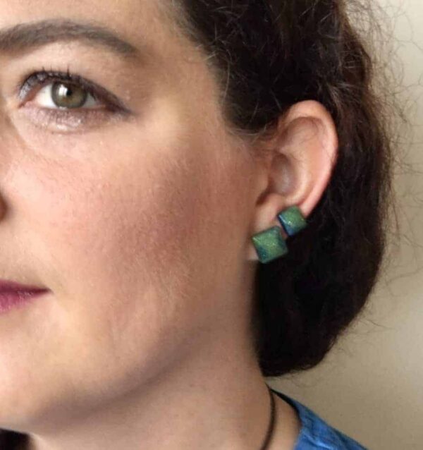 Aurora borealis inspired studs.