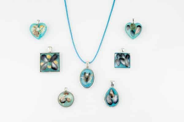 Sea blue resin beach pendants from Shetland.