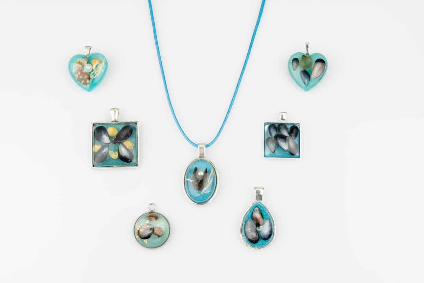 Sea blue resin beach pendants from Shetland. - Image 1