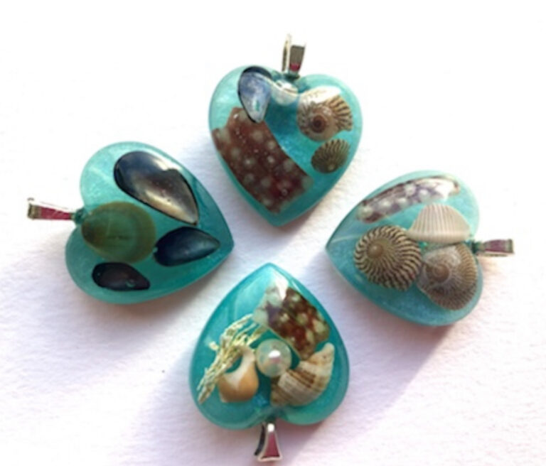 Sea blue resin beach pendants from Shetland.