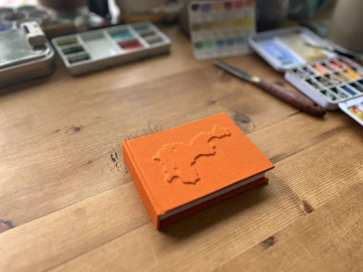 Small Embossed Tiree Watercolour Sketchbook - Orange - Image 1
